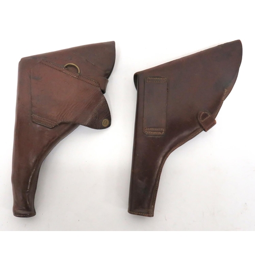 272 - Two WW1 Pattern Officer Revolver Leather Holster
consisting brown leather example.  Top flap se... 