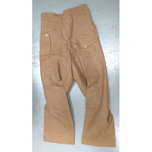 282 - 1940 Pattern Battledress Trousers
khaki woollen, wide leg trousers.  Right hip with pleated fir... 