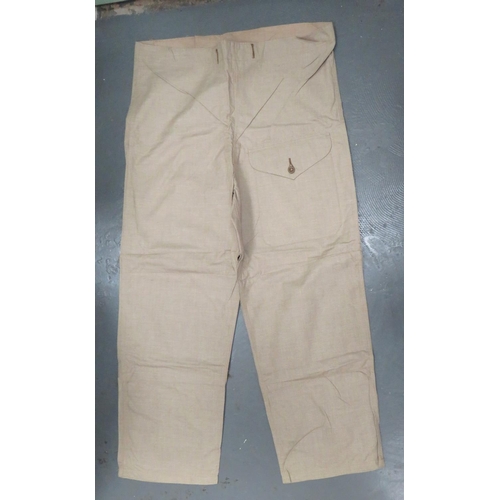 296 - WW2 Dated Khaki Over Trousers
light khaki tan, cotton, wide leg, over trousers.  Front of left leg w... 