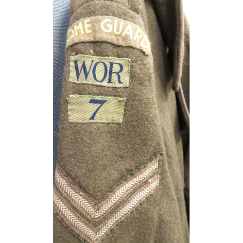 297 - 1939 Pattern Double Breasted Home Guard Greatcoat
khaki woollen, double breasted coat.  Lower hidden... 