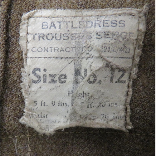 298 - Pair Of 1937 Pattern Battledress Trousers
khaki woollen, wide leg trousers.  Right hip with first ai... 