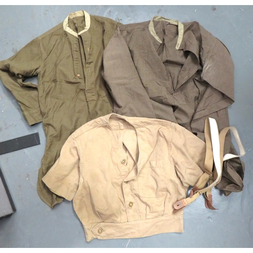 305 - Three Military Shirts
consisting 2 x WW2 khaki, collarless, half fastened front, cotton examples.  S... 