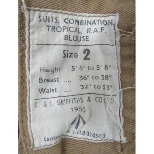 305 - Three Military Shirts
consisting 2 x WW2 khaki, collarless, half fastened front, cotton examples.  S... 