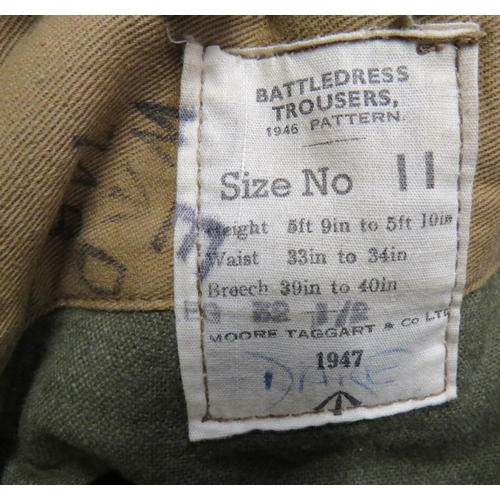 323 - Two Pairs Of 1946 Pattern Battledress Trousers
consisting khaki, woollen, wide leg trousers.  R... 