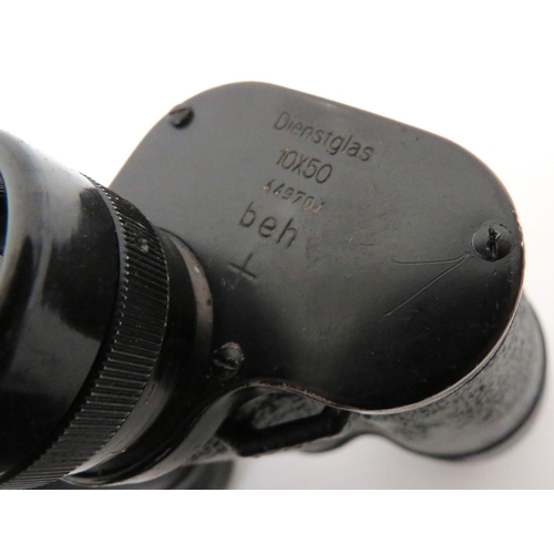 353 - WW2 Third Reich 10 x 50 Binoculars
black crinkle body.  Blackened alloy frames.  The top m... 