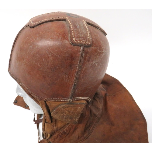 378 - WW1 American Balloon Airship Protective Flying Helmet
brown, hard leather, four panel crown.  Soft l... 