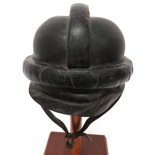 379 - Imperial German Protective Flying Helmet
hard, black leather crown.  Central padded leather com... 