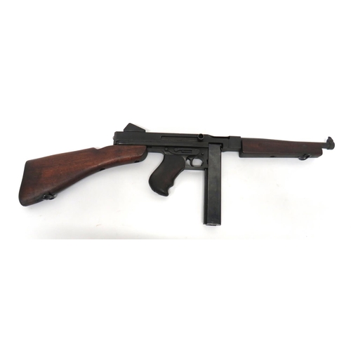 405 - Deactivated US Model MIAI Thompson SMG
.45 ACP, 11 inch, blackened barrel with blade sight.  Blacken... 