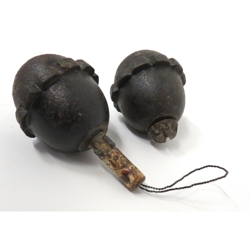 432 - Two WW1 Imperial German Inert Egg Grenades
cast iron, egg shape grenades with central fragmentation ... 