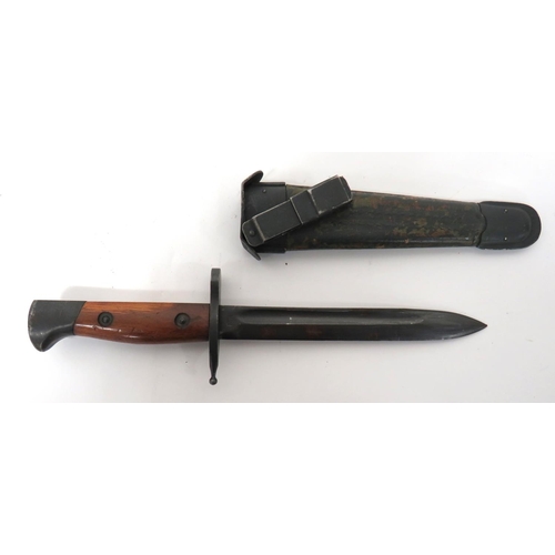 491 - Post WW2 Italian Combat Knife
6 1/2 inch, single edged, blackened blade.  Narrow fuller.  ... 