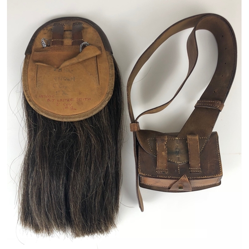 421 - London Scottish Sporran and cartridge pouch.   Good clean sporran with brown leather cantle mounted ... 