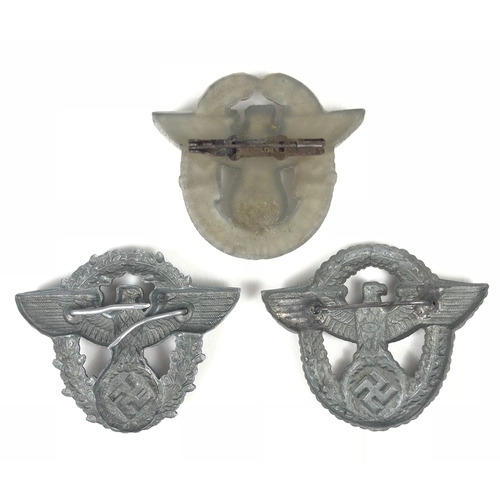 461 - German Third Reich 3 Police cap badges.  2nd pattern die-stamped late war eagle and swastika superim... 