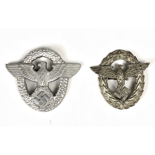 462 - German Third Reich 1st and 2nd pattern Police cap badges.  1st pattern die-stamped silvered metal ea... 