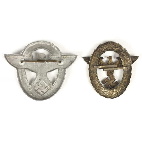 462 - German Third Reich 1st and 2nd pattern Police cap badges.  1st pattern die-stamped silvered metal ea... 