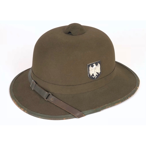 471 - WW2 German Army Afrika Korps issue sun helmet.  A good clean example of green felt material with lea... 