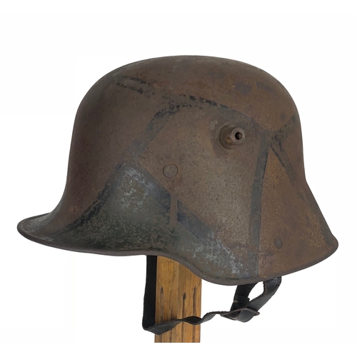 473 - Imperial German WW1 Camouflage Steel Helmet.  A good and scarce example with camouflaged painted fin... 