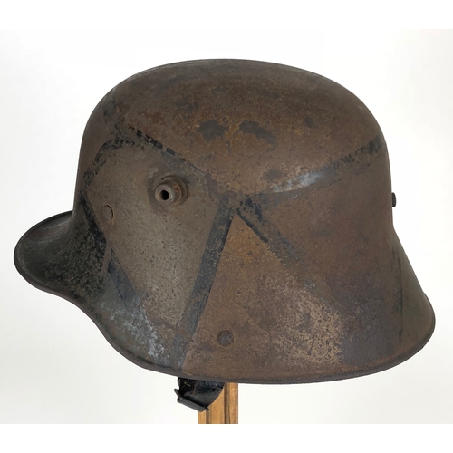 473 - Imperial German WW1 Camouflage Steel Helmet.  A good and scarce example with camouflaged painted fin... 