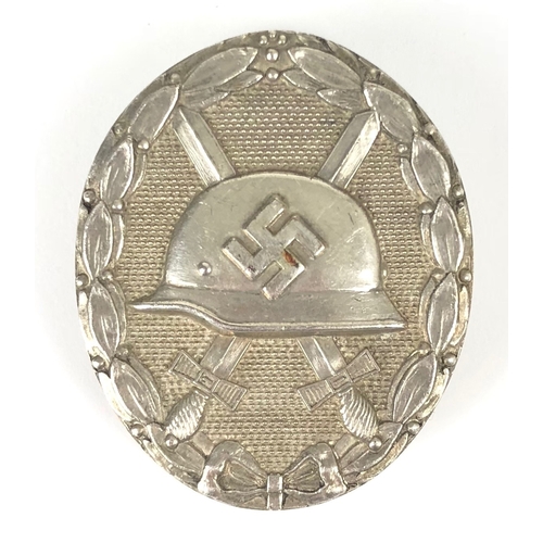 477 - German Third Reich WW2 1939 Wound Badge in Silver by Hauptmuzamt, Wien.  A good scarce die-cast soli... 