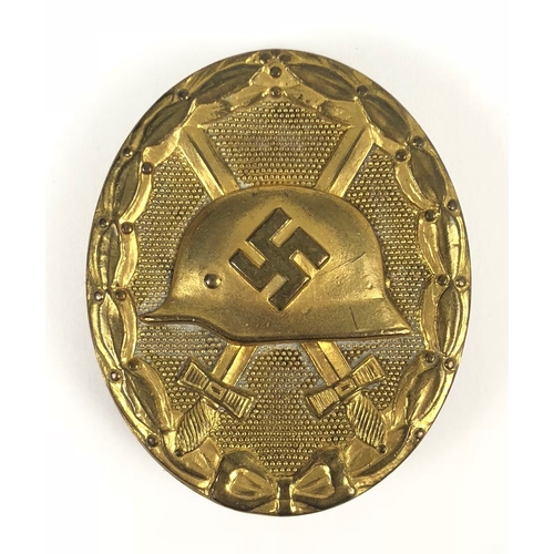 508 - German Third Reich WW2 1939 Wound Badge in Gold by Hauptmuzamt, Wien. A good scarce die-cast solid e... 