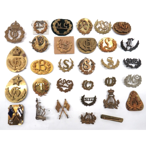 104 - 31 x Brass Trade Badges
titles within wreaths include MG ... LG ... S ... T ... L ... R ... HG ... C... 