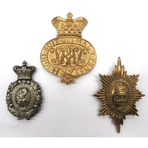 124 - Three Various Victorian Badges
consisting London Scottish Volunteers, white metal, Vic crown pouch b... 