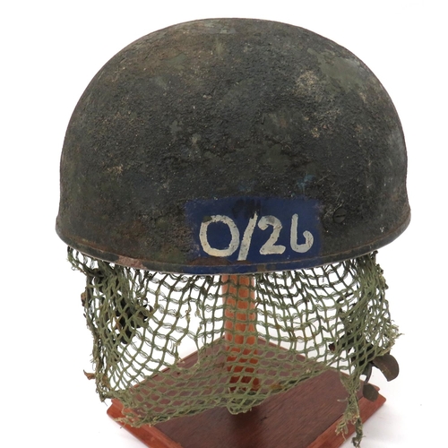 159 - Post War 1956 Dated Airborne Parachutist's Steel Helmet
green, rough texture steel helmet.  The... 