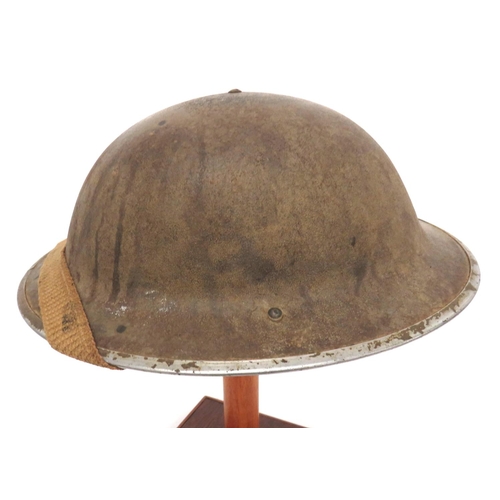 169 - 1942 Dated MKII Steel Helmet
light khaki, rough texture finish.  Black treated linen liner. &nb... 