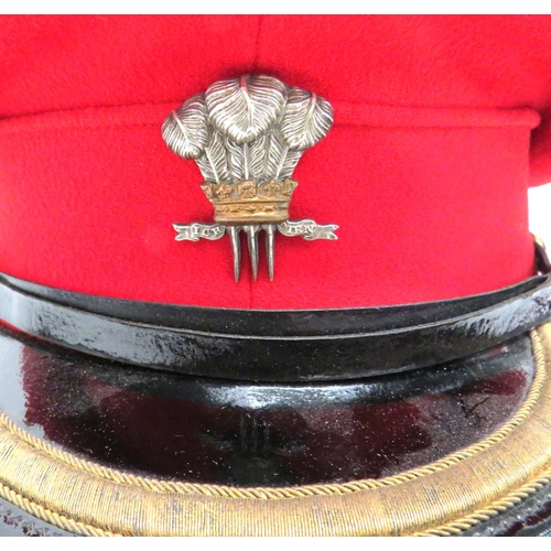 175 - 10th Royal Hussars Field Officer's Dress Cap
scarlet crown and body.  Black patent peak with gi... 