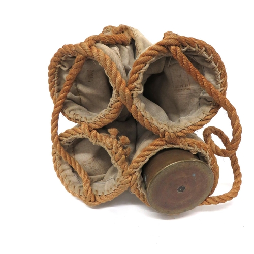 216 - Scarce Quadruple Shell Carrier
heavy, cream canvas tubes to hold four shells.  Rope edging to t... 