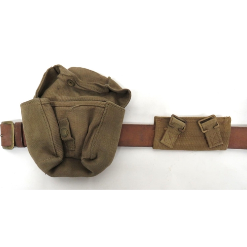 220 - WW2 Home Guard Belt And Pouch Set
consisting brown leather belt dated 1943.  Brass buckle. &nbs... 