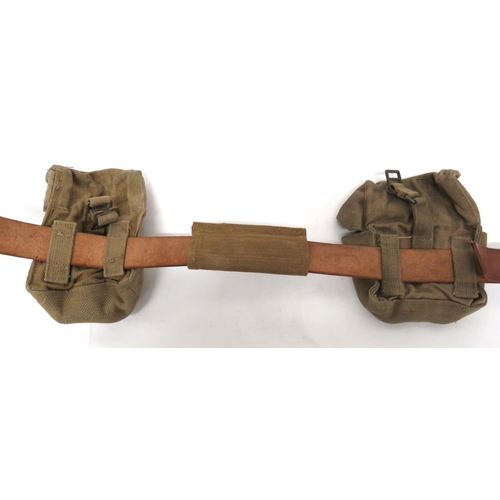 220 - WW2 Home Guard Belt And Pouch Set
consisting brown leather belt dated 1943.  Brass buckle. &nbs... 