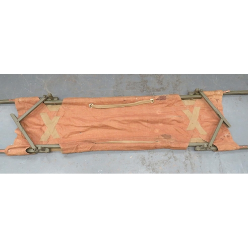 231 - WW2 Pattern Airborne Folding Stretcher
folding, tubular steel framework with lower steel legs.  ... 