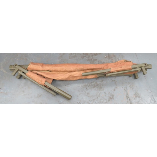 231 - WW2 Pattern Airborne Folding Stretcher
folding, tubular steel framework with lower steel legs.  ... 