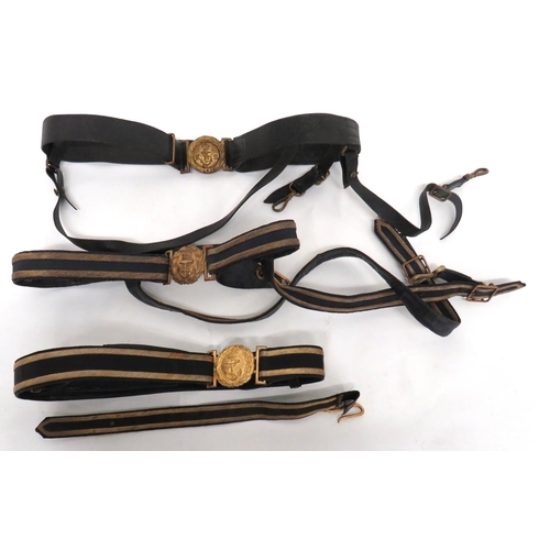 243 - Three Royal Navy Officer Belts
consisting 2 x post 1901 examples.  Black belts with gilt wire e... 