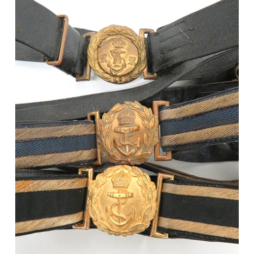 243 - Three Royal Navy Officer Belts
consisting 2 x post 1901 examples.  Black belts with gilt wire e... 