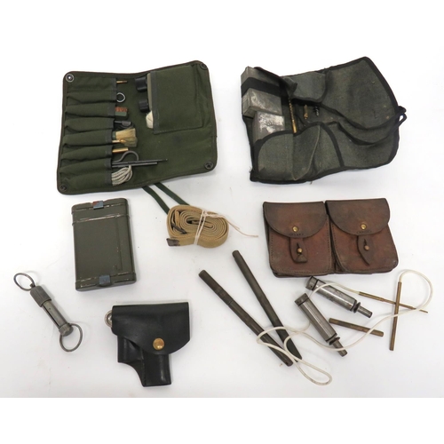 255 - Selection Of Various Rifle Cleaning Kits 
including a German rifle kit in tin ... 2 x German oi... 