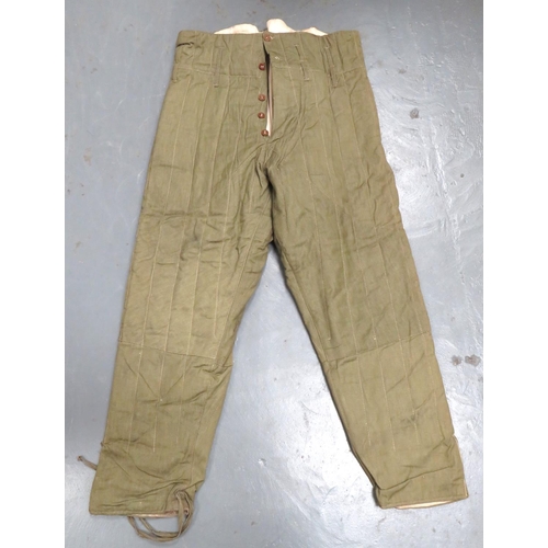 295 - WW2 Padded Cold Weather Trousers
green denim, padded trousers.  Fly button front.  Left wa... 