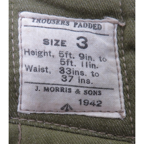 295 - WW2 Padded Cold Weather Trousers
green denim, padded trousers.  Fly button front.  Left wa... 