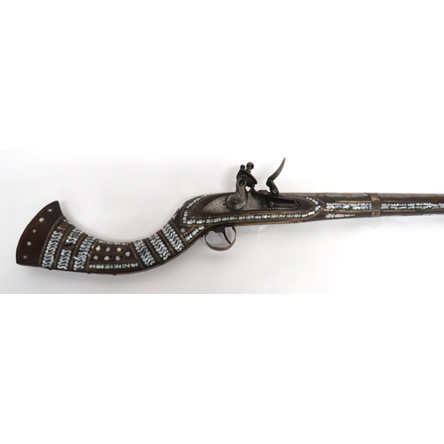 371 - 19th Century Indian Flintlock Jezail Musket
51 inch, smoothbore barrel with flare out muzzle.  ... 