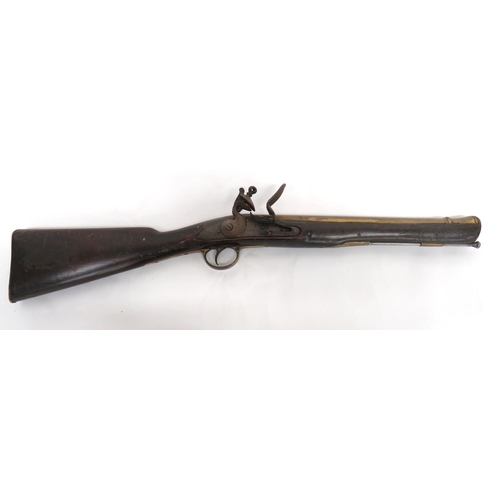 372 - Indian Re-Stocked Flintlock Blunderbuss
15 inch, brass blunderbuss with flared out muzzle.  Mil... 