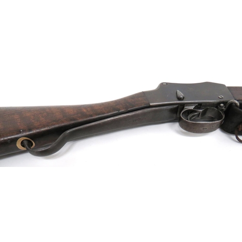 418 - Obsolete Calibre Martini Henry MKIV Long Lever Rifle
.577/450, 32 1/2 inch, blued rifled barrel. &nb... 