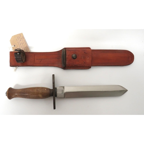 499 - Falklands Period Argentine Combat Knife
8 inch, double edged, shallow point blade.  Forte stamp... 