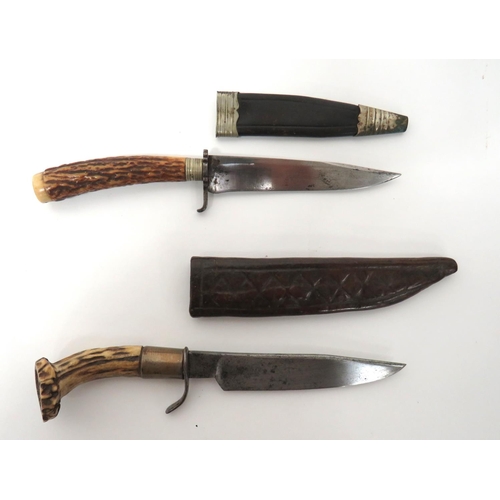 502 - Two Antler Grip Combat/Hunting Knives
consisting single edged example.  Blade stamped 