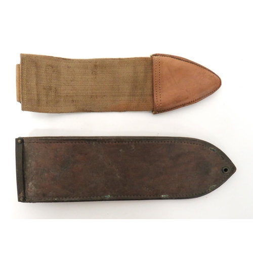 509 - Two American Knife Scabbards
consisting M1917 bolo knife canvas and leather tipped over scabbard.  R... 