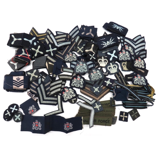 82 - Quantity Of Royal Air Force Rank
including embroidery LAC ... Braid Corporal ... Embroidery Sergeant... 