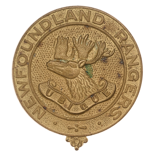 173 - Newfoundland Rangers head-dress badge c. 1935-49.  Good scarce die-stamped brass circular title circ... 