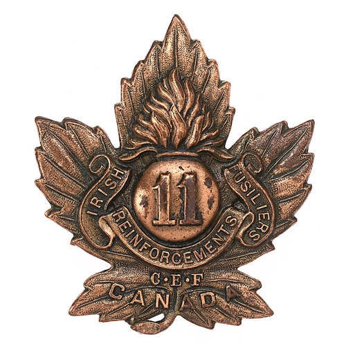 177 - 11th Irish Fusiliers Reinforcements Canadian WW1 CEF cap badge.   Good scarce die-stamped bronzed co... 