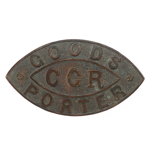 198 - Ceylon Government Railway Goods Porter’s cap badge.  Good scarce die-stamped brass elliptical exampl... 