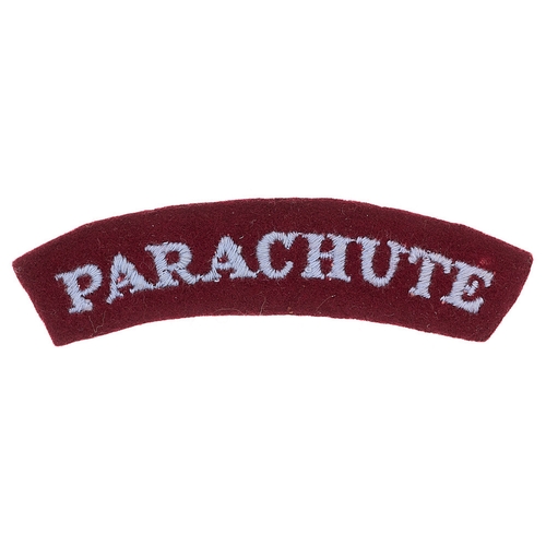 253 - PARACHUTE WW2 cloth shoulder title c. 1943.  Good scarce light blue embroidered serif letters on sli... 