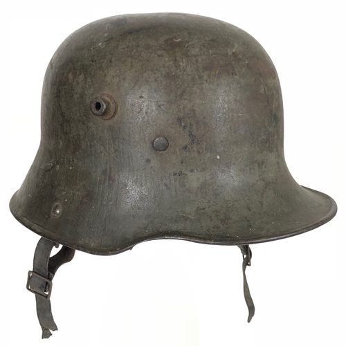 482 - Imperial German WW1 Steel Helmet.  A good and scarce example with original green painted finish to t... 